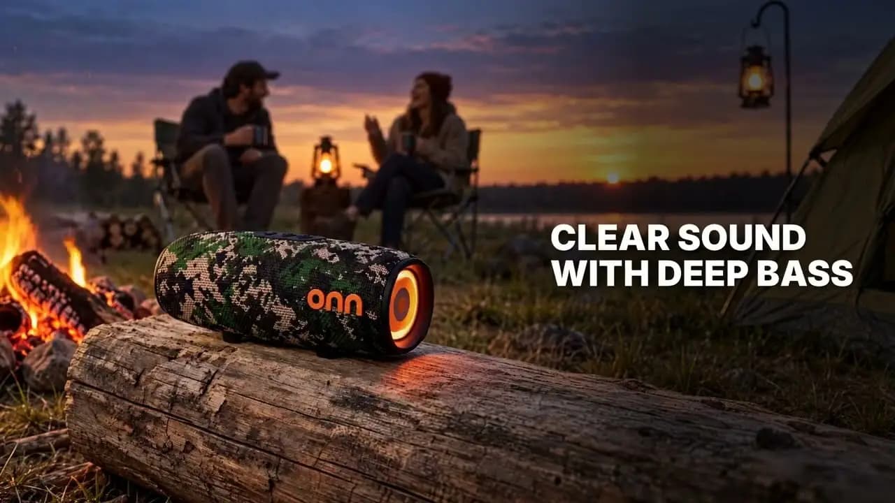 onn. medium rugged speaker in camo resting on a log by a lakeside campfire beside the clear sound with deep bass headline
